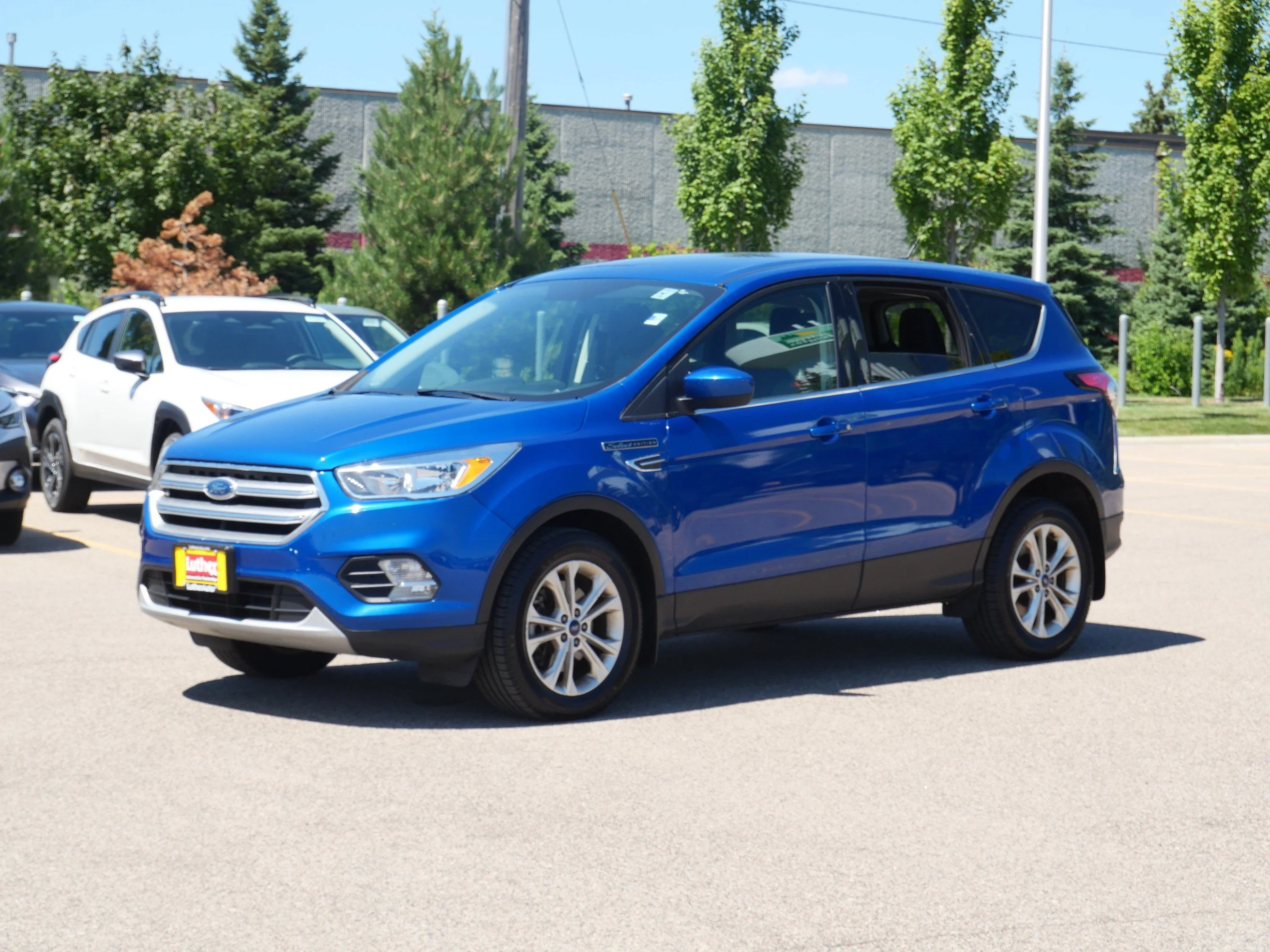 Used 2017 Lightning Blue Metallic Ford SE image 3