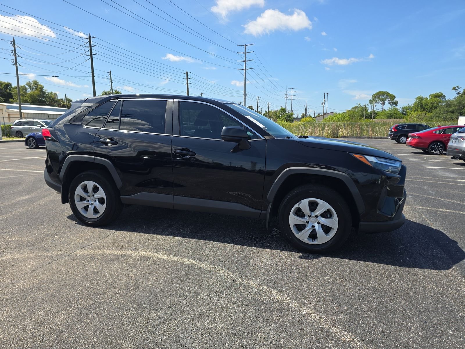 Used 2024 Black Toyota LE image 2