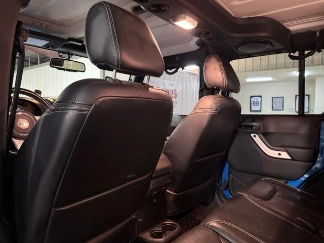 Used 2014 Blue Jeep Unlimited Sahara image 12