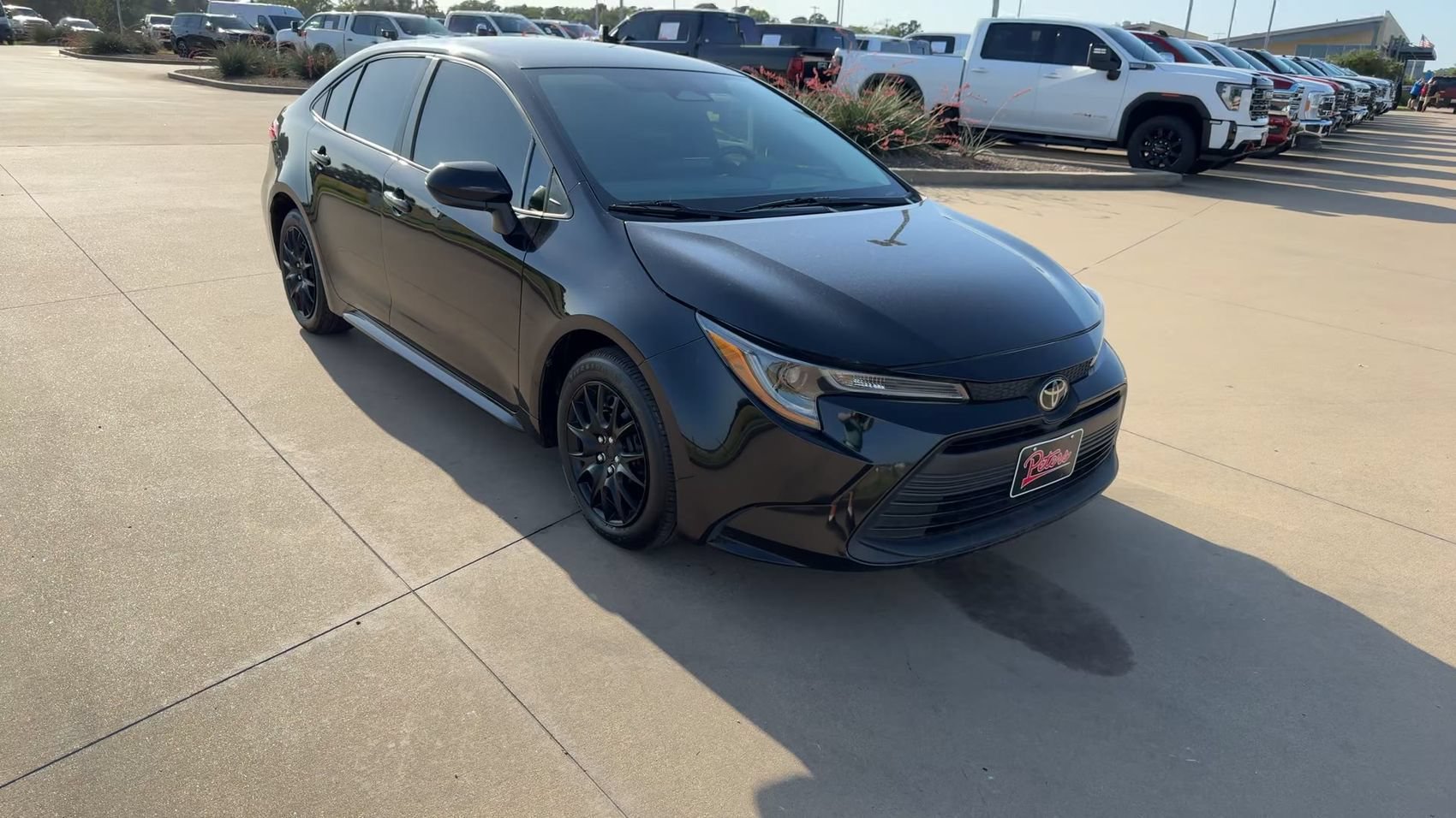 Used 2024 Midnight Black Metallic Toyota LE image 3