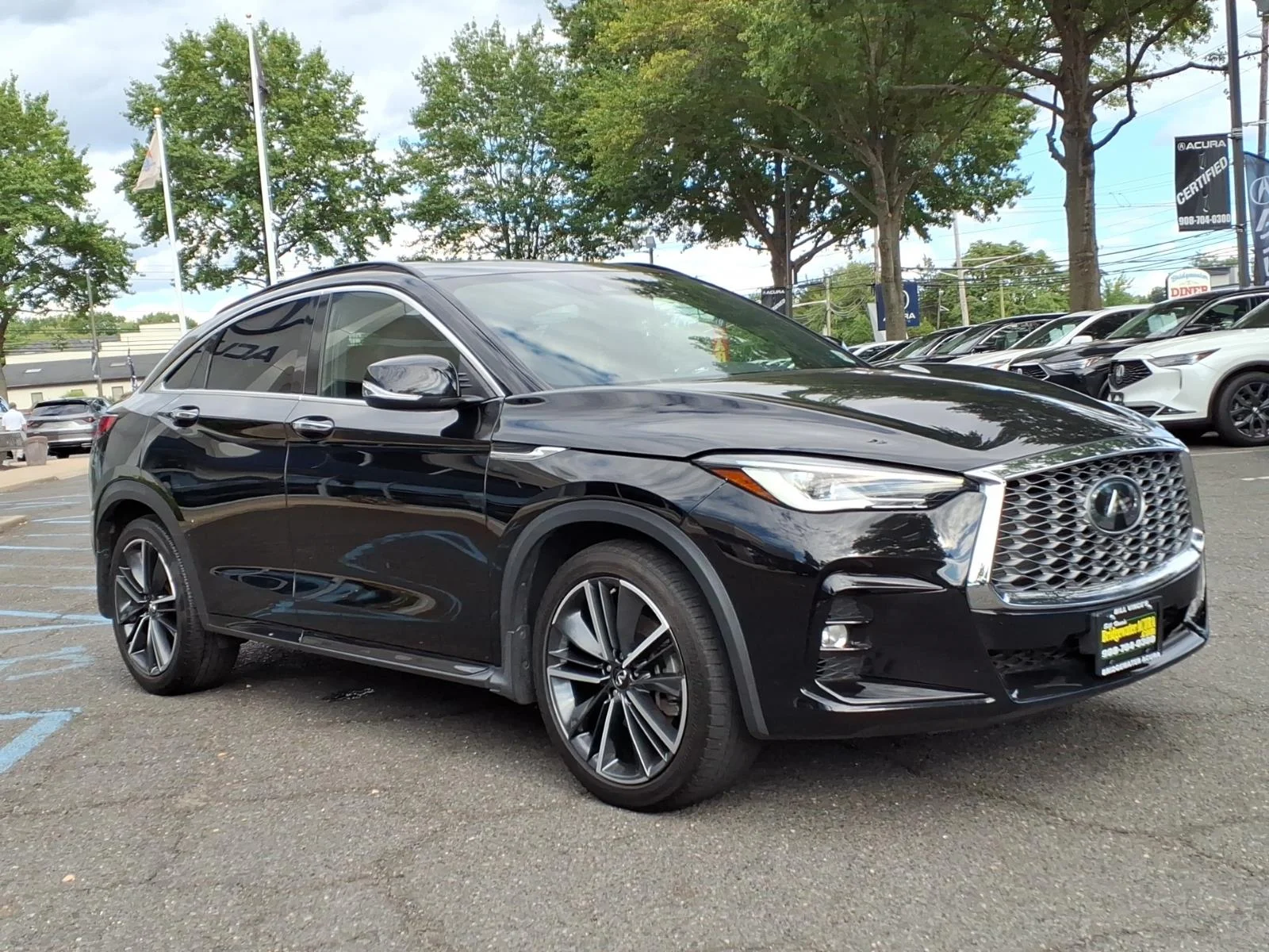 Used 2023 Black Obsidian INFINITI Luxe image 3