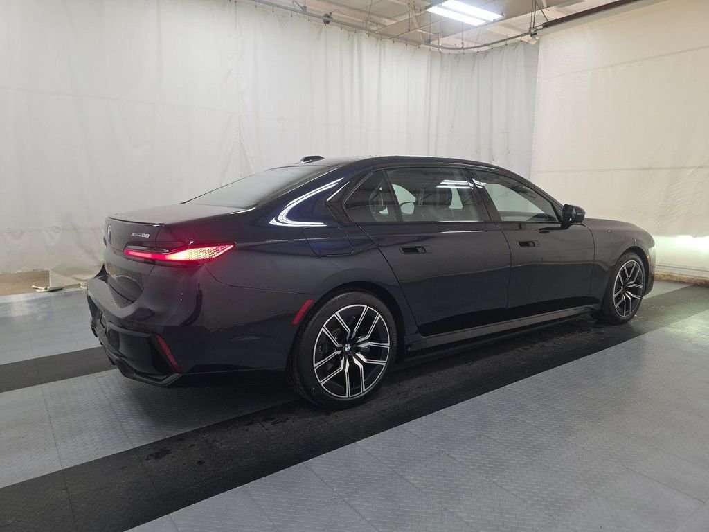 Certified Used 2024 Black BMW xDrive60 image 2