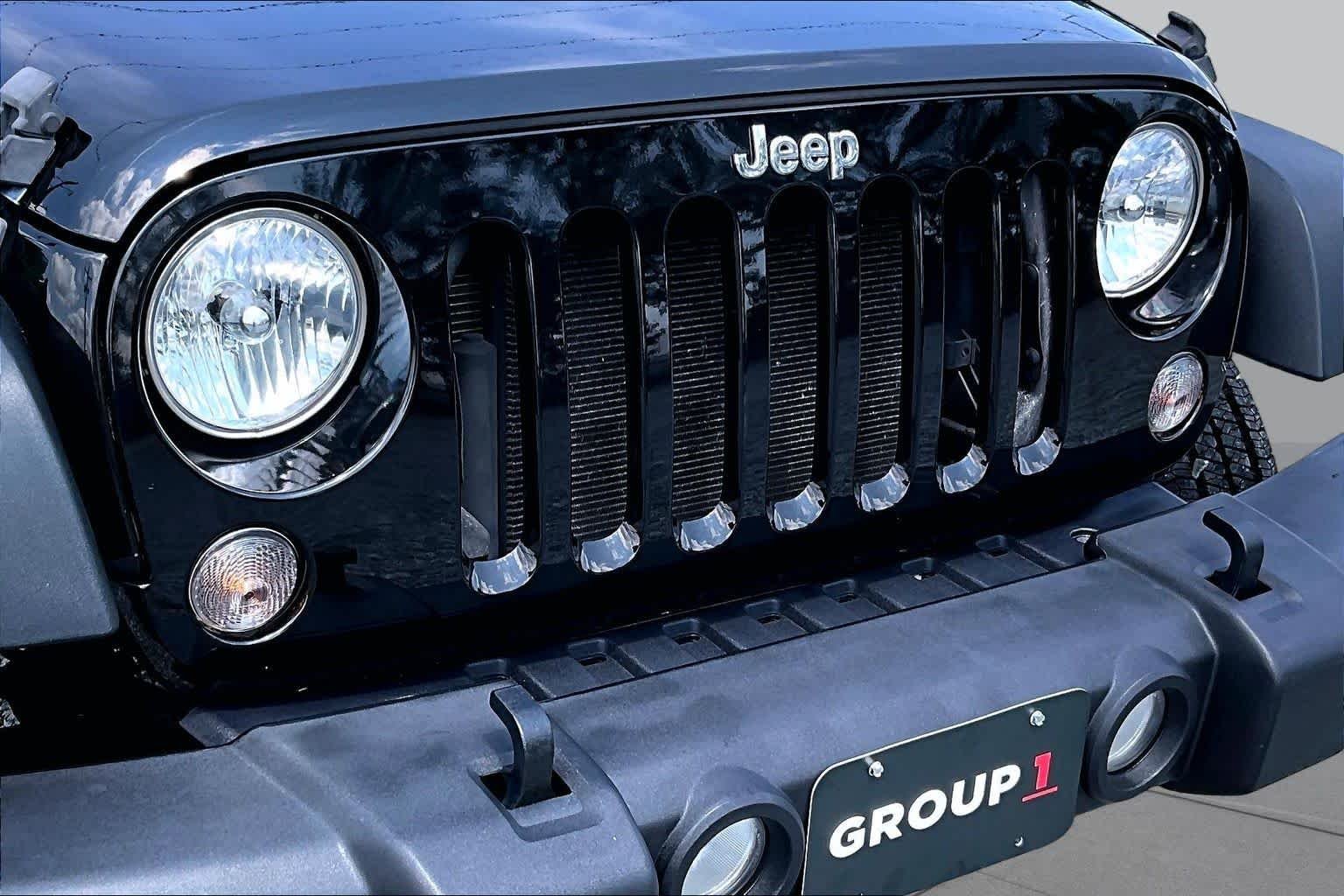 Used 2016 Black Clearcoat Jeep Sport image 30