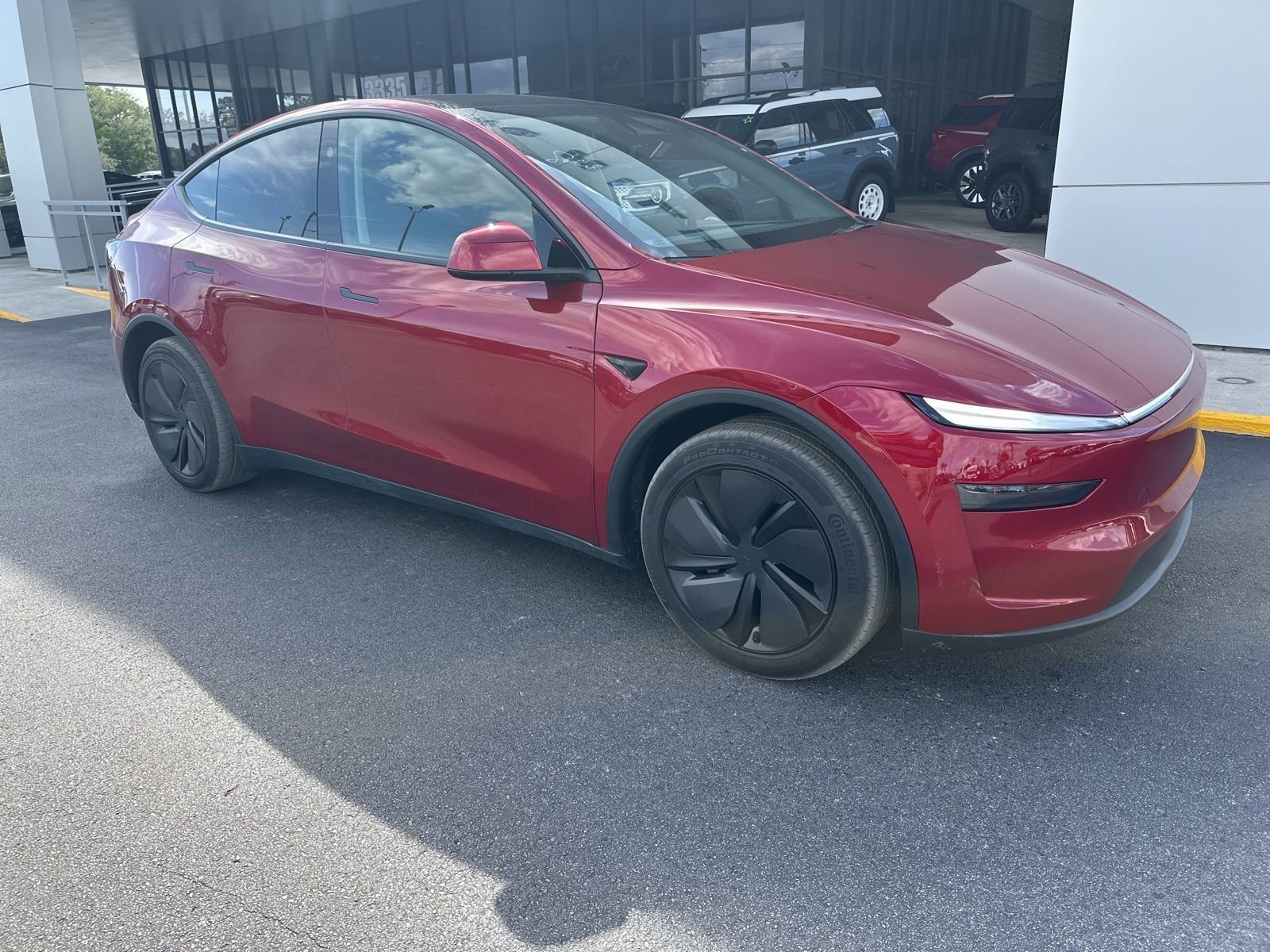 Used 2026 Tesla Model Y Long Range with VIN 7SAYGDEE2TF334260 for sale in Spring Hill, FL