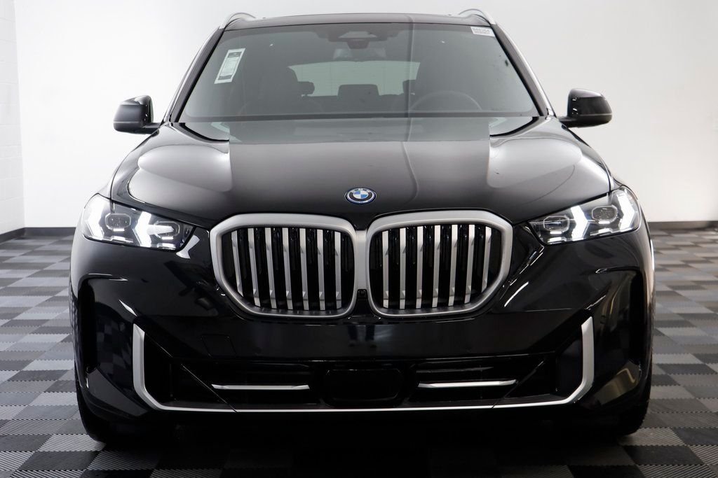 New 2026 Black Sapphire Metallic BMW xDrive50e image 21
