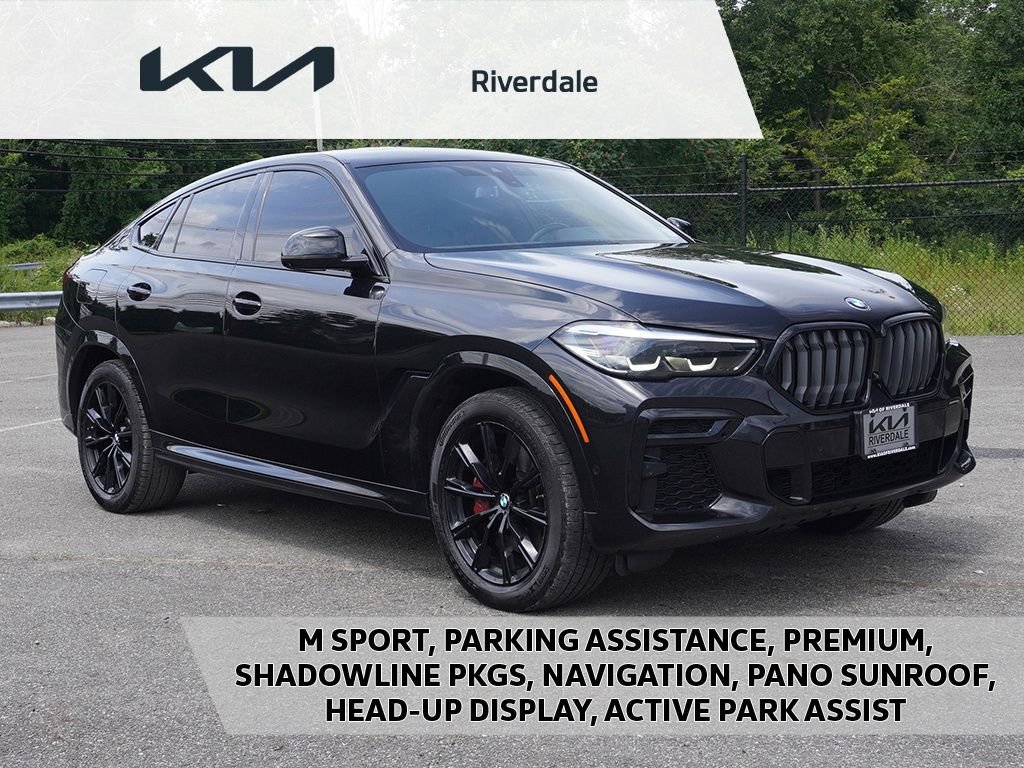 Used 2022 Black BMW xDrive40i image 1