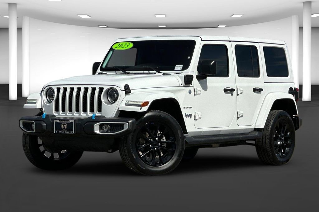 Used 2023 Jeep Wrangler 4xe Sahara 4XE with VIN 1C4JJXP65PW554050 for sale in Kerman, CA