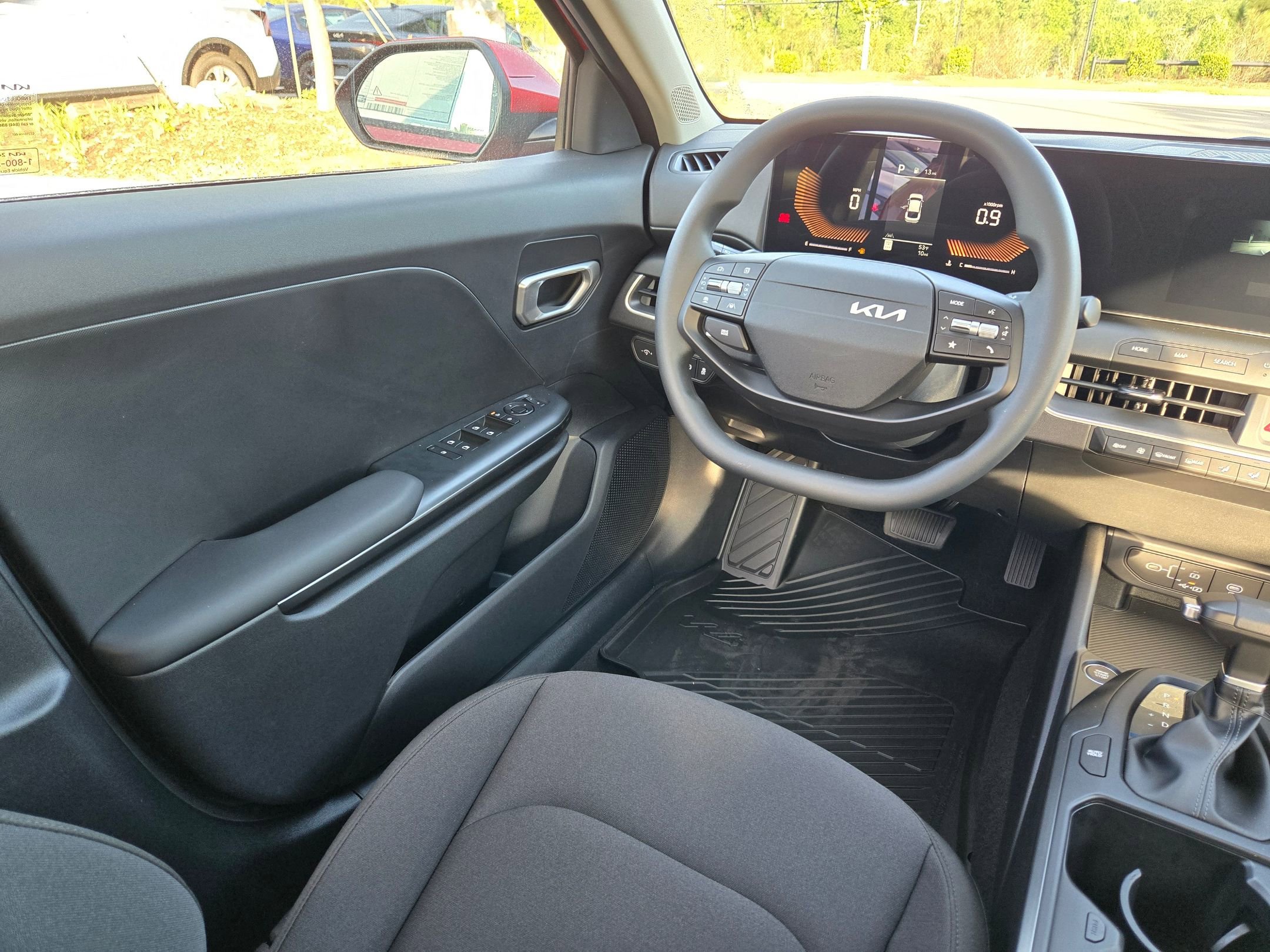 New 2026 Currant Red Kia LXS image 9