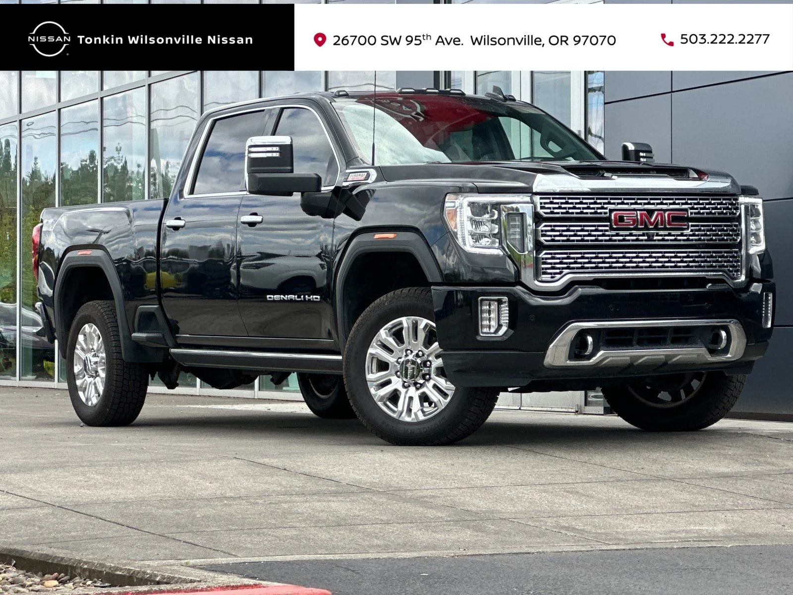 Used 2022 Ebony Twilight Metallic GMC Denali image 1