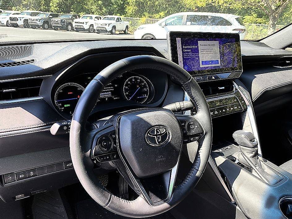 Used 2024 Celestial Black Toyota LE image 8