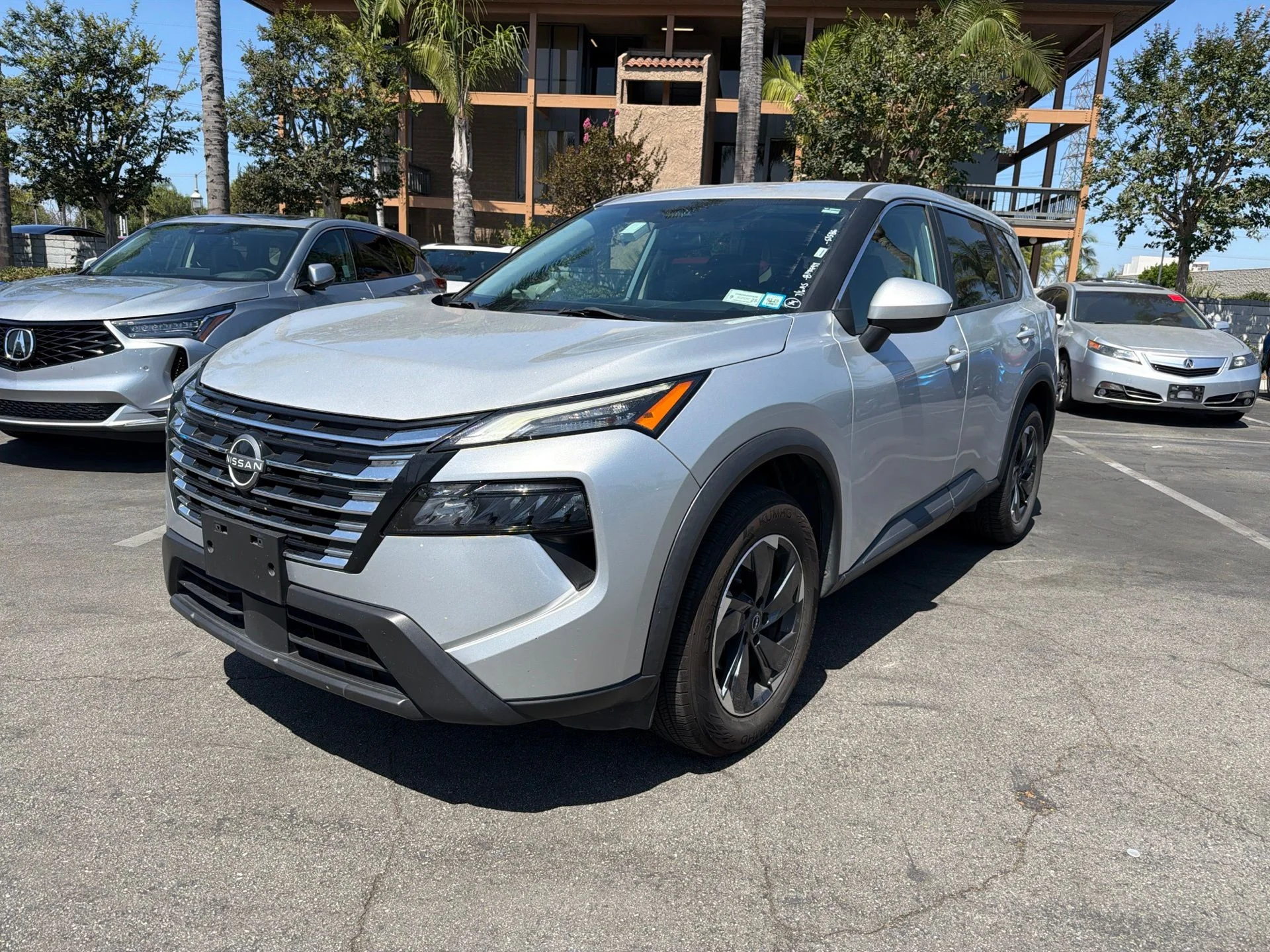Used 2024 Silver Nissan SV image 1