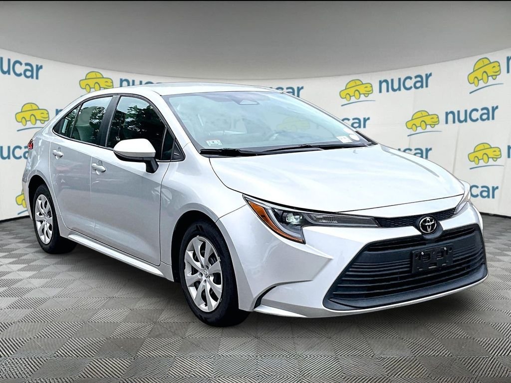 Used 2023 Silver Toyota LE image 1