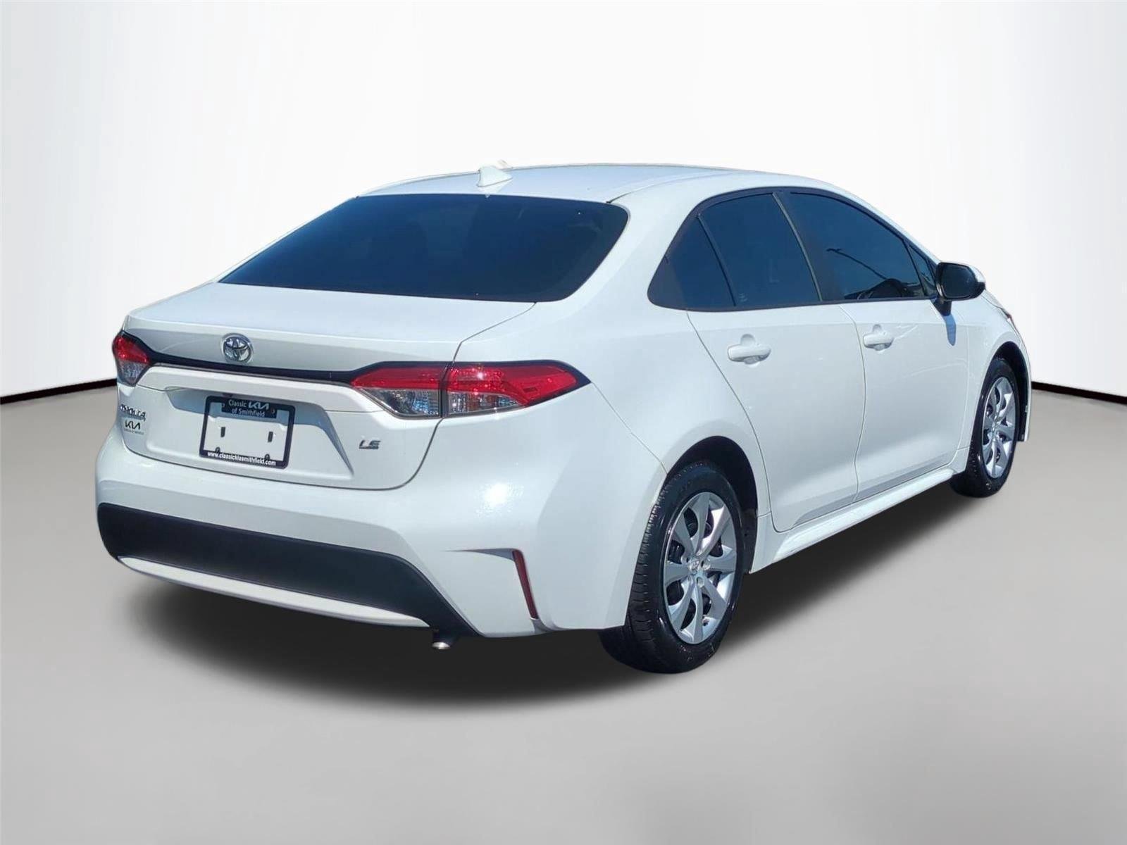 Used 2021 Super White Toyota LE image 5