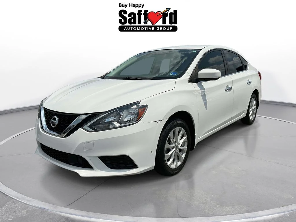 Used 2019 White Nissan SV image 1