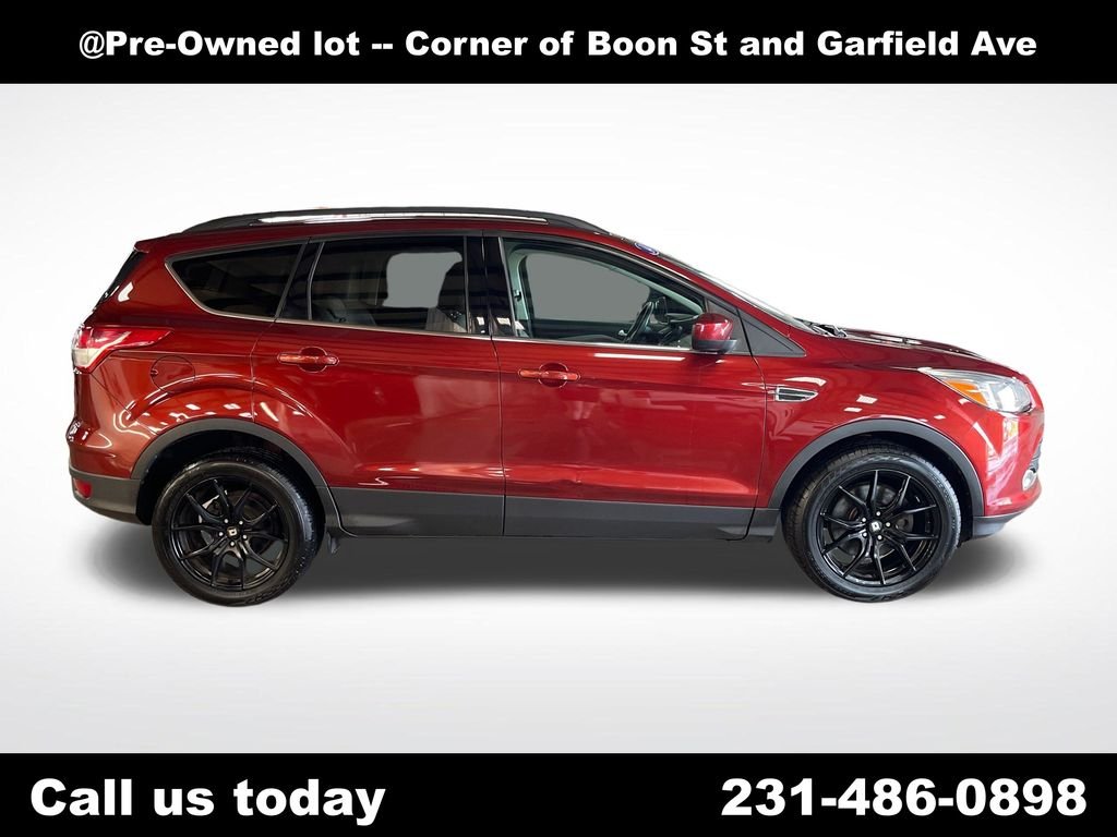 Used 2014 Orange Ford SE image 6