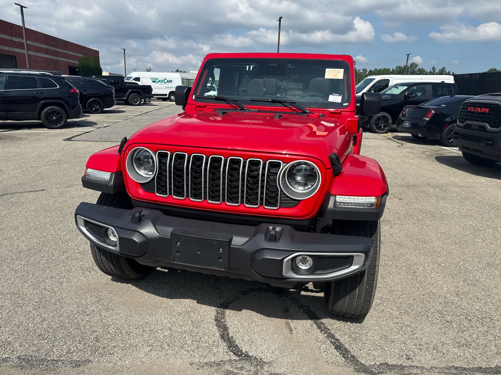 Used 2025 Firecracker Red Clearcoat Jeep Sahara image 9