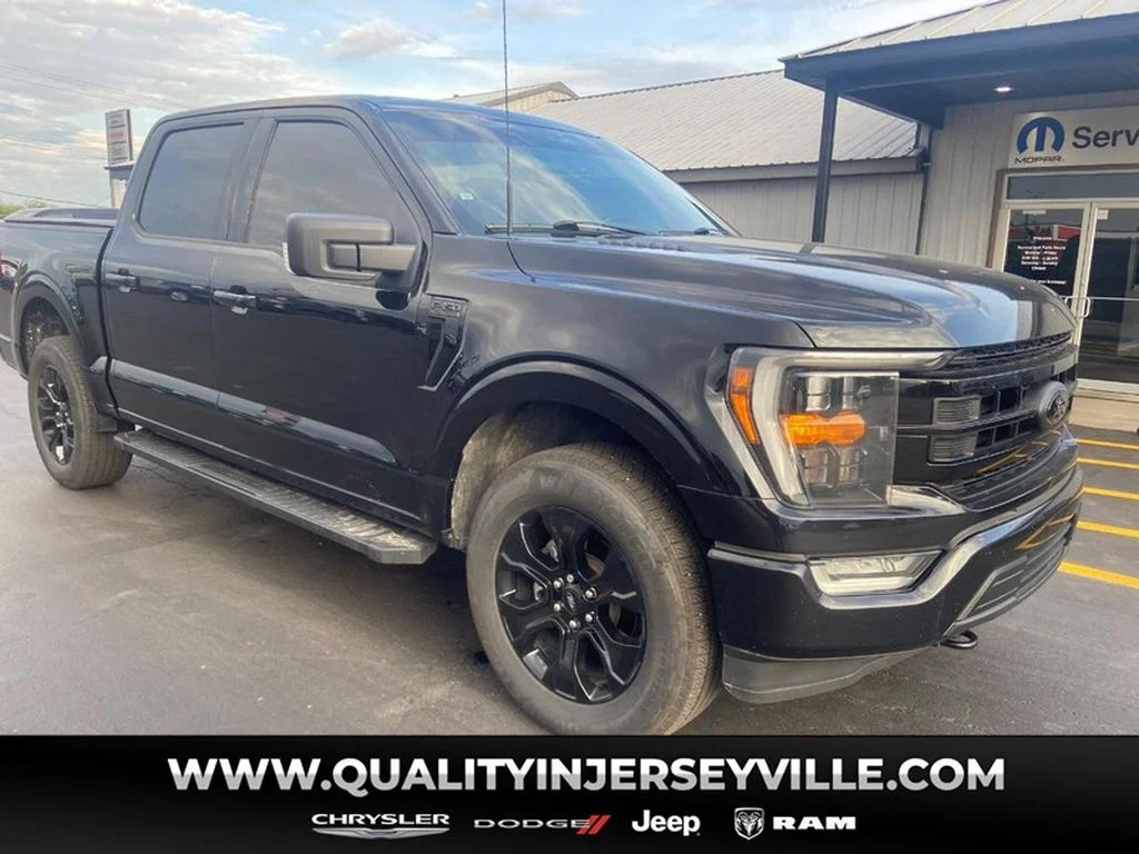 PRE-OWNED 2023 FORD F-150 XLT