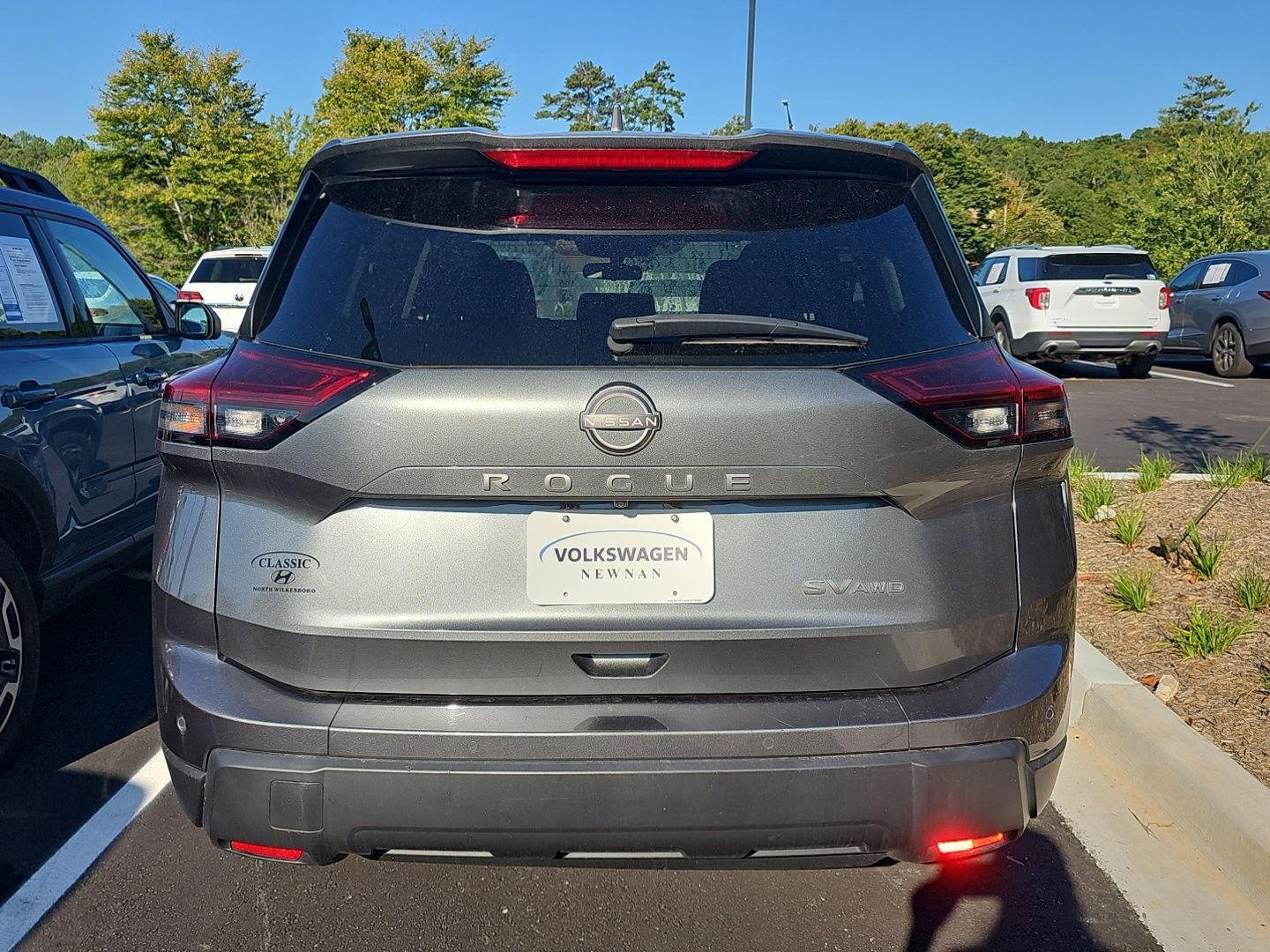 Used 2024 Gun Metallic Nissan SV image 4
