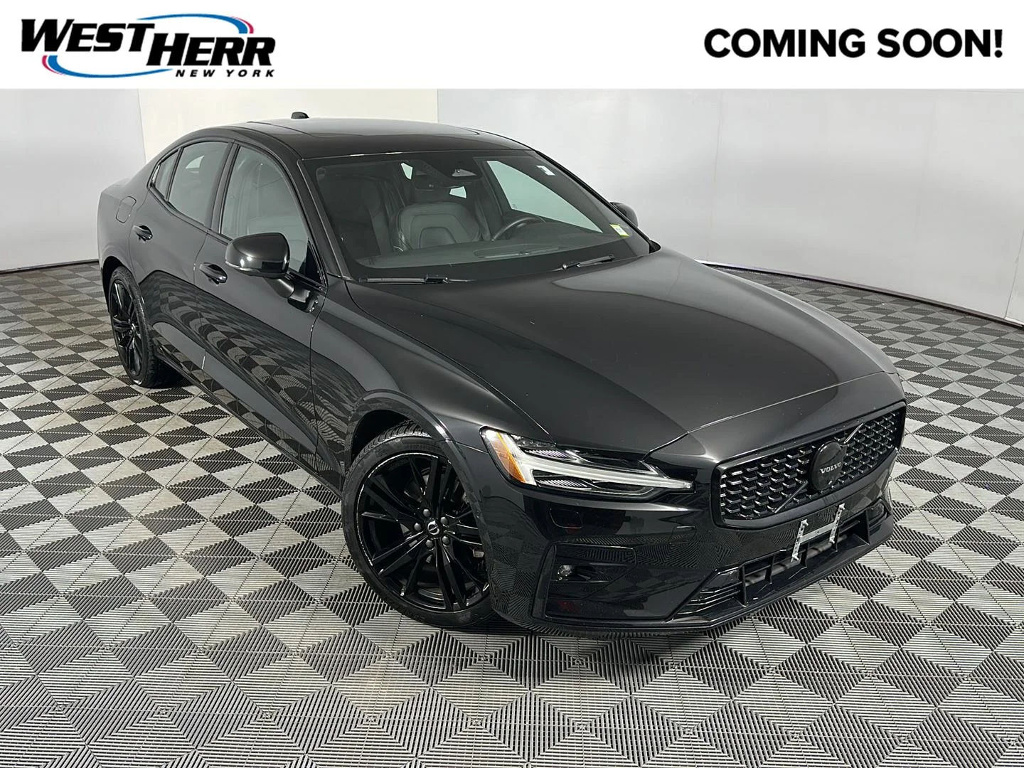 Used 2024 Onyx Black Metallic Volvo Plus Black Edition image 1