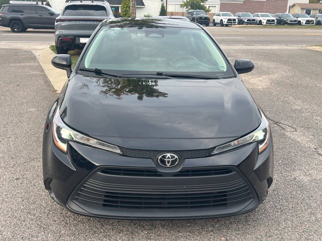 Used 2025 Midnight Black Metallic Toyota LE image 21