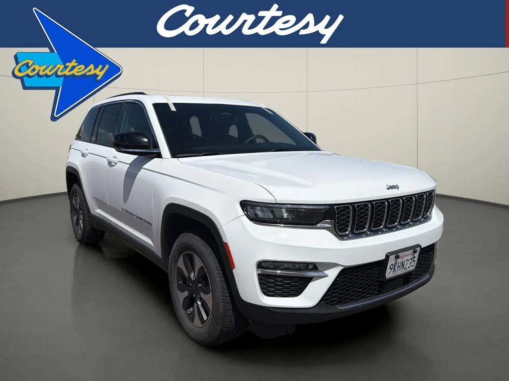 Used 2024 Bright White Clearcoat Jeep 4xe image 1