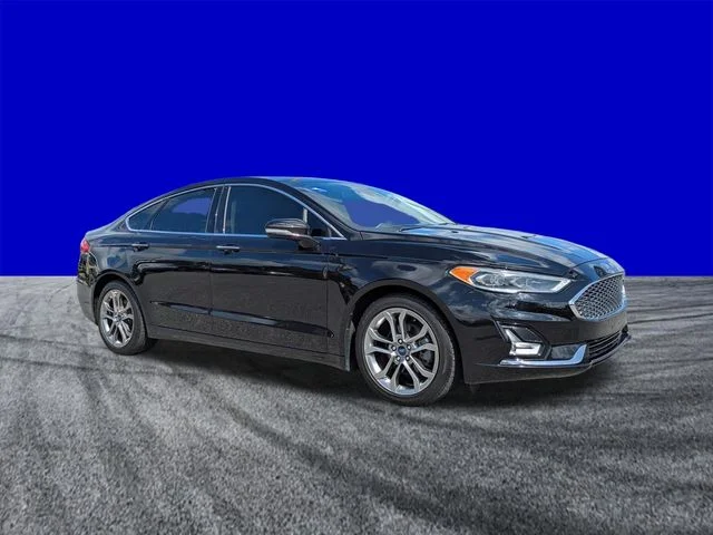 Certified Used 2020 Agate Black Metallic Ford Titanium image 2