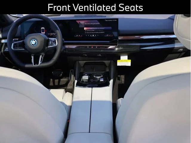 New 2026 Mineral White Metallic BMW 550e xDrive image 17