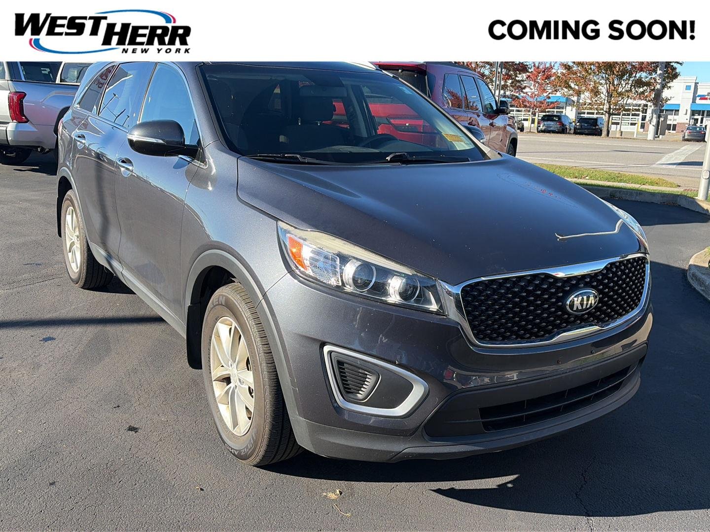 Used 2017 Platinum Graphite Kia LX image 1