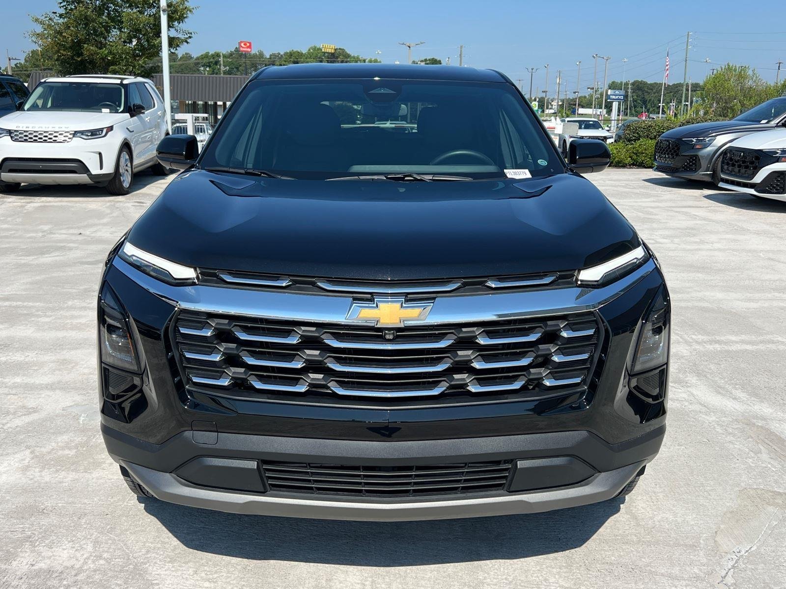 Used 2026 Mosaic Black Metallic Chevrolet FWD LT image 2