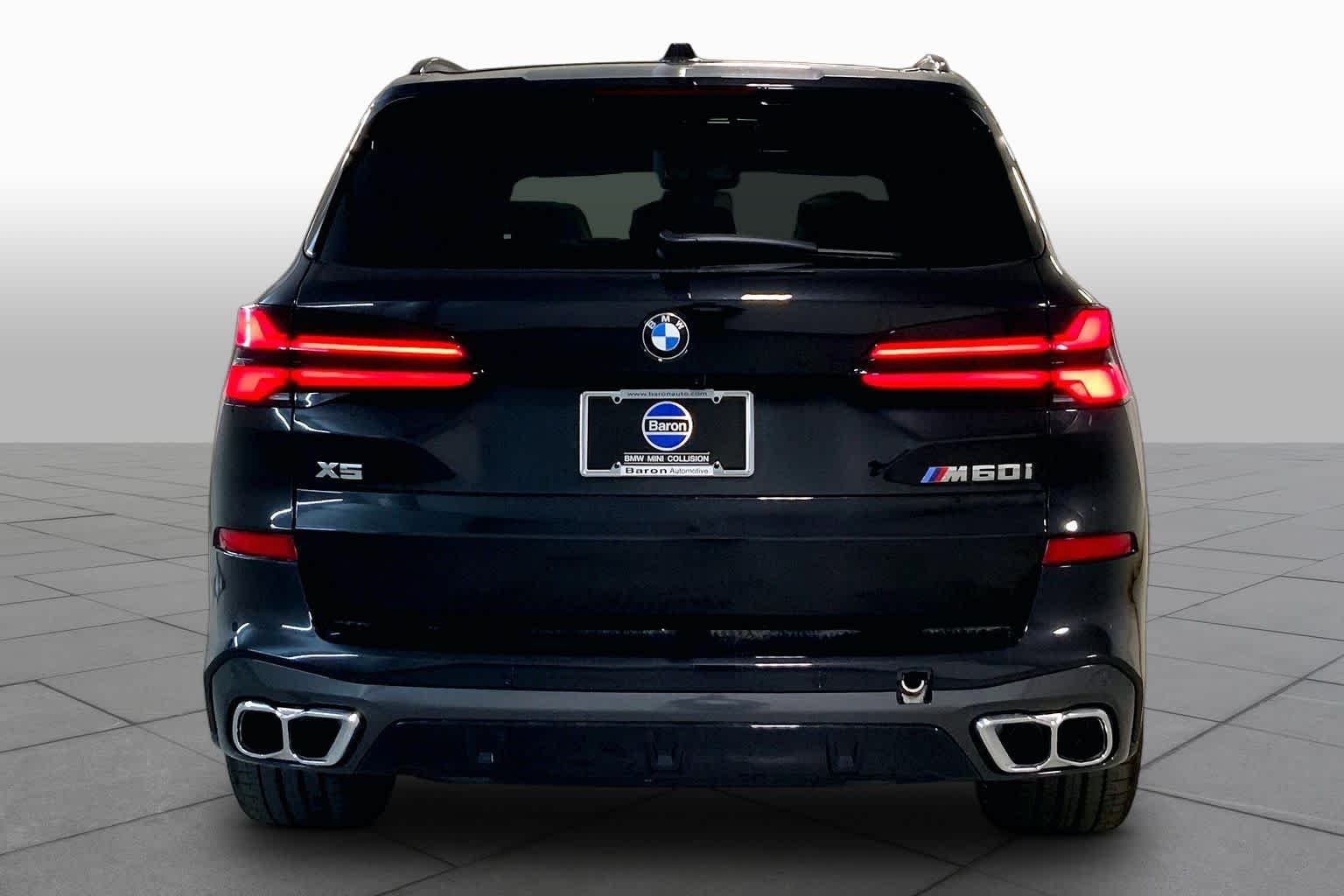 New 2026 Black Sapphire Metallic BMW M60i image 4