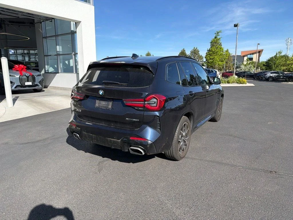Used 2024 Carbon Black Metallic BMW xDrive30i image 5