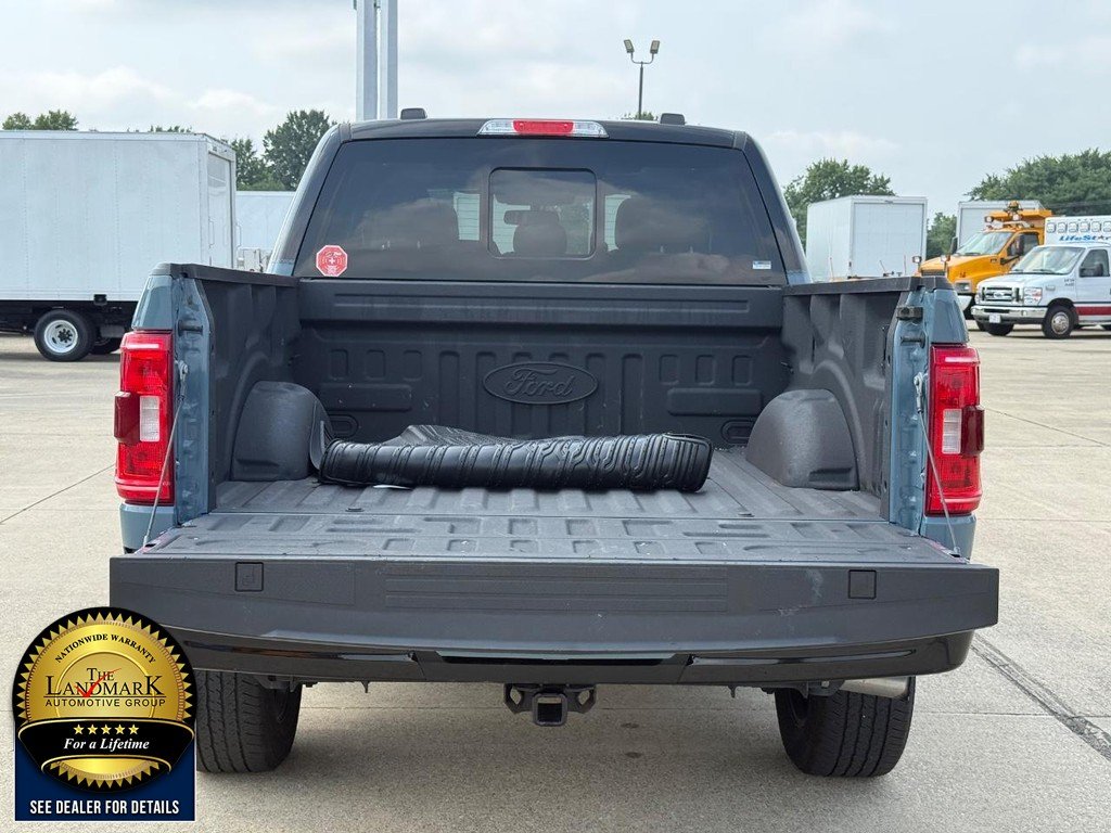 Used 2023 Area 51 Blue Ford XLT 4WD SuperCrew 6.5