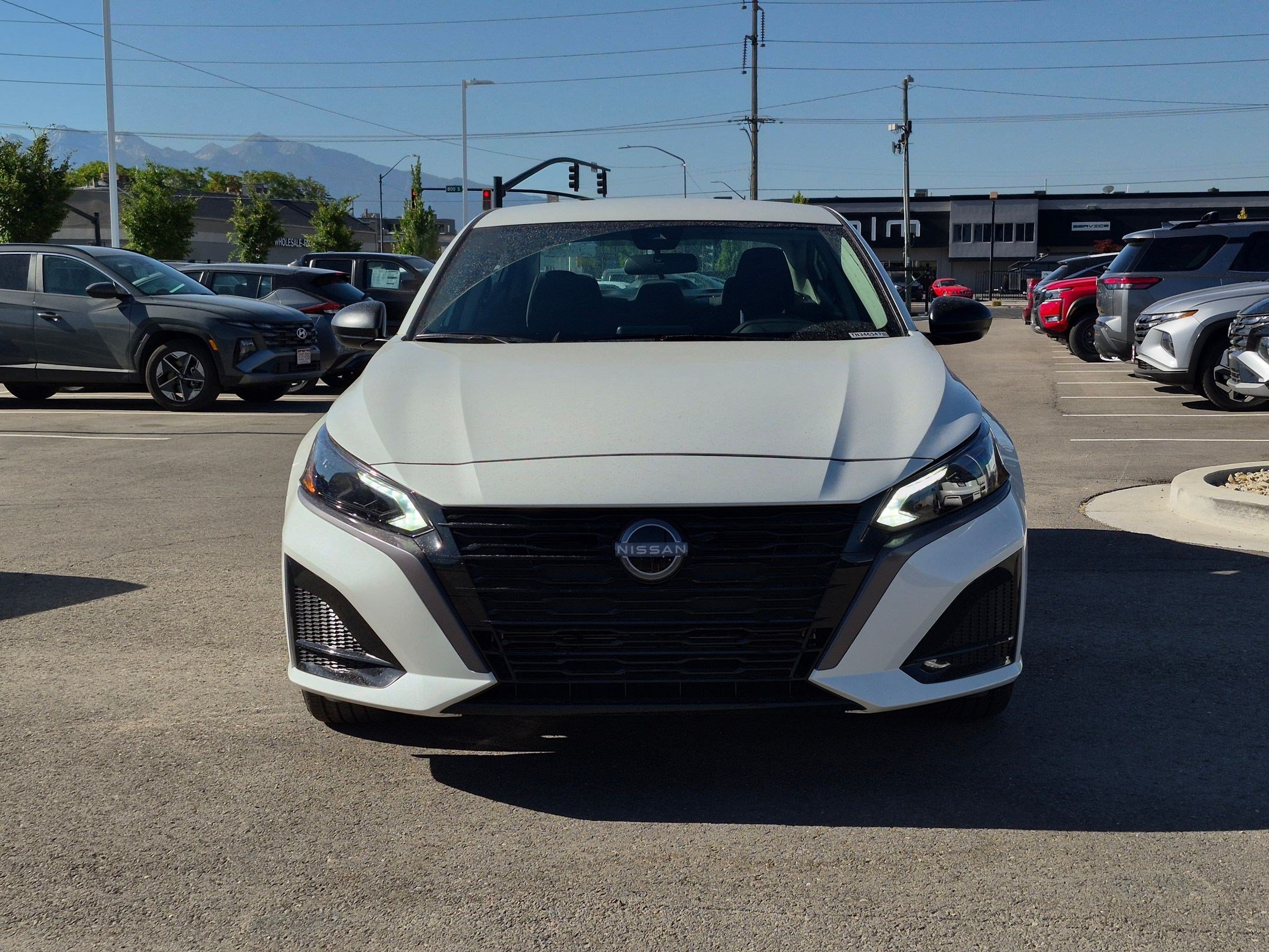 New 2026 Pearl White Tricoat Nissan SV image 9