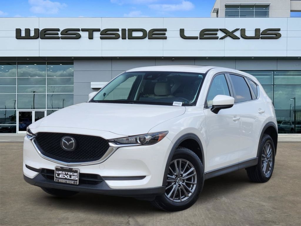 Used 2019 Snowflake White Pearl Mazda Touring image 1