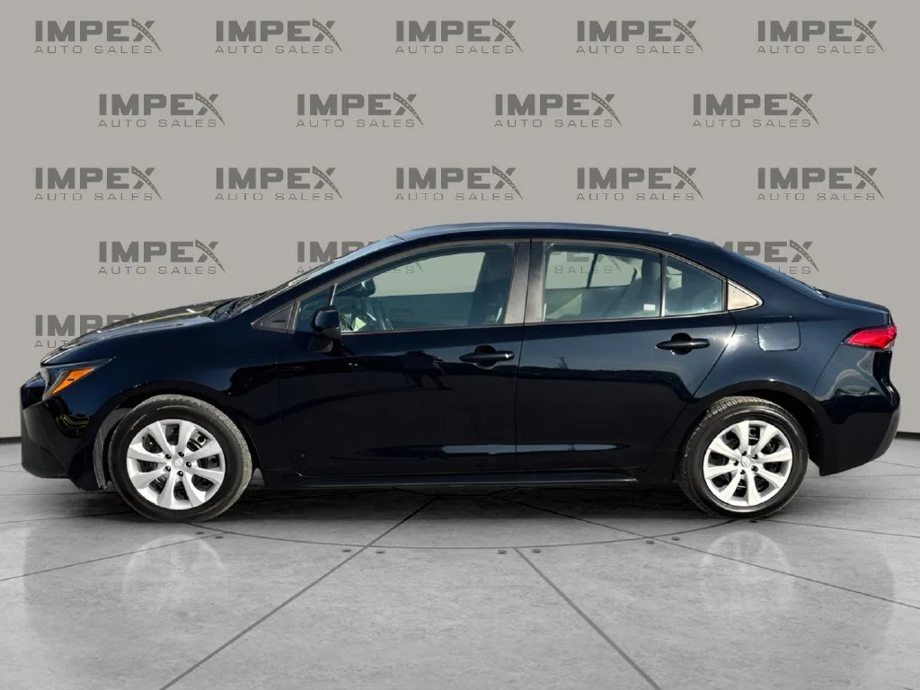 Used 2023 Black Toyota LE image 2