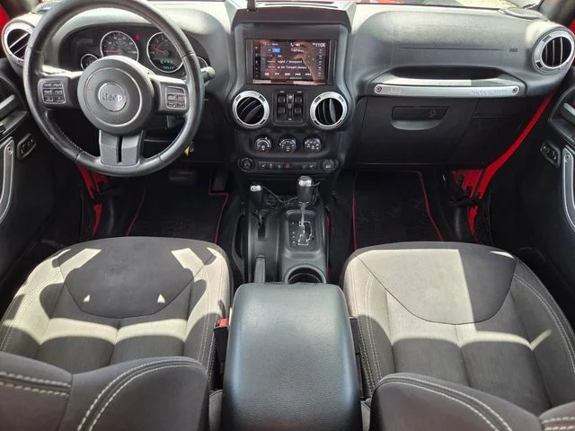 Used 2015 Red Jeep Unlimited Sahara image 16