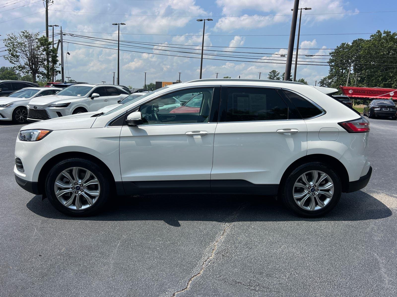 Used 2022 Star White Metallic Tri-Coat Ford Titanium image 8
