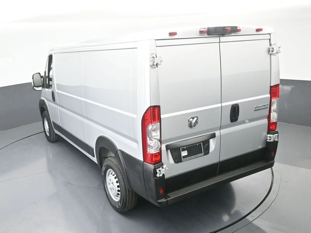 Used 2025 Bright Silver Clearcoat Metallic Ram Low Roof image 40