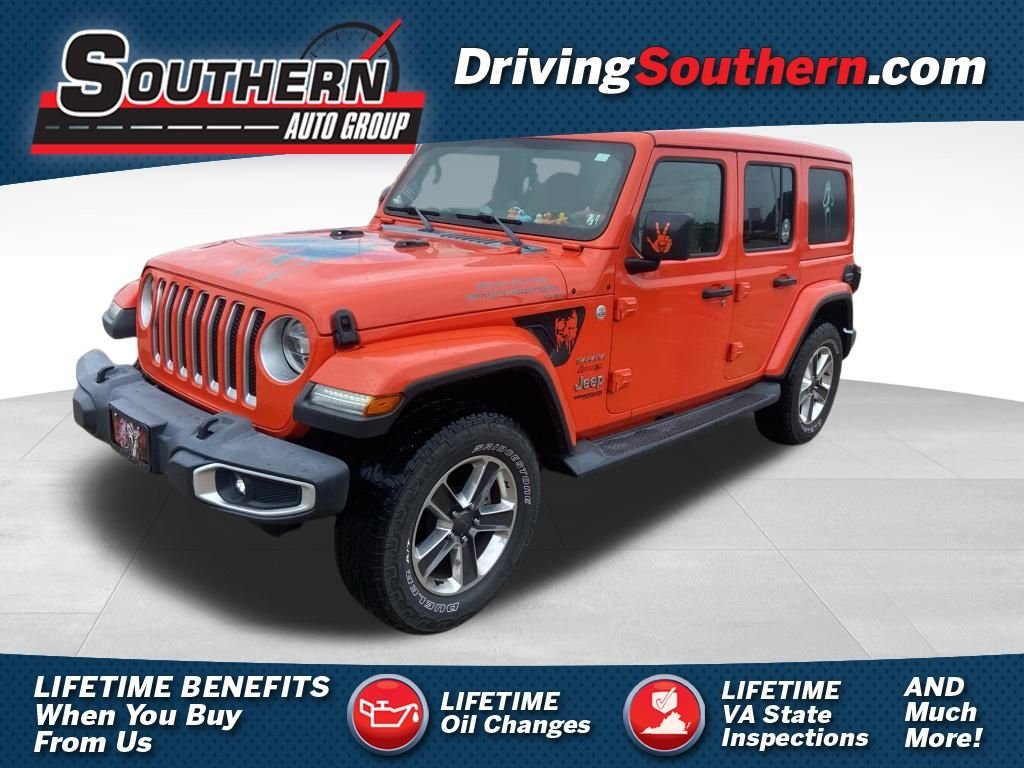 Used 2019 Orange Jeep Unlimited Sahara image 1