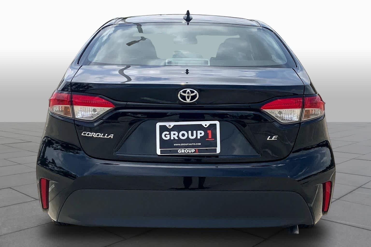 Used 2024 Midnight Black Metallic Toyota LE image 5