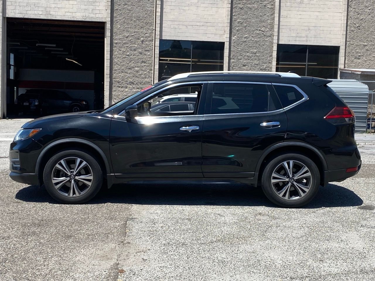 Used 2019 Magnetic Black Pearl Nissan SV image 2