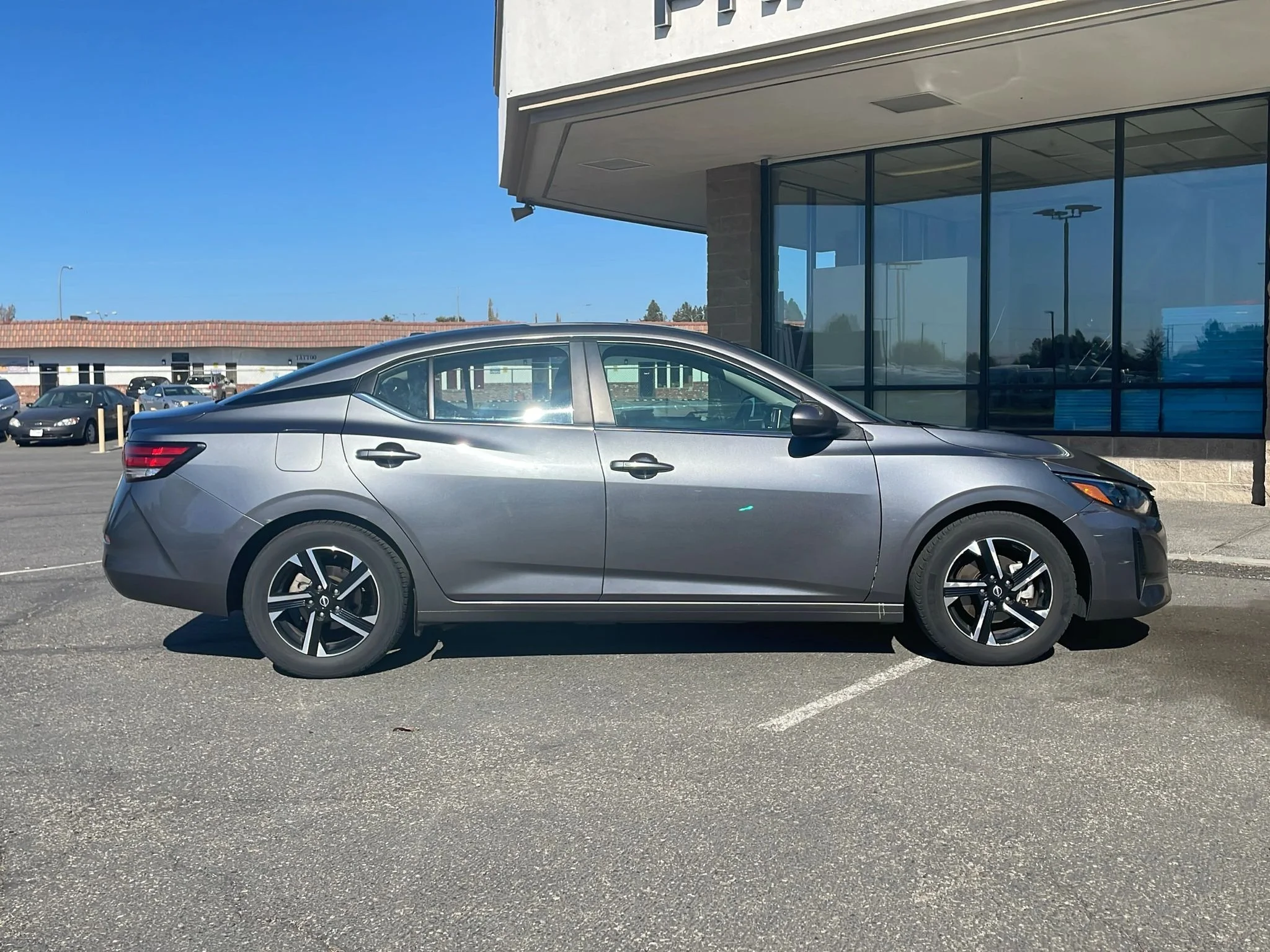 Used 2024 Gun Metallic Nissan SV image 8