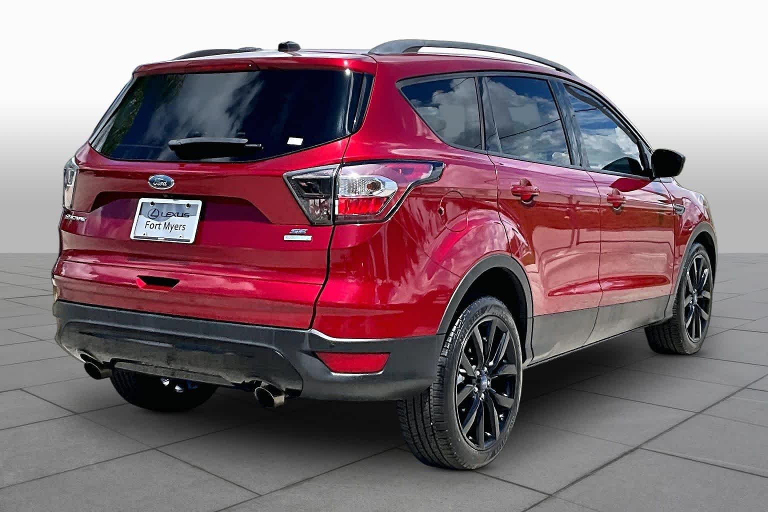 Used 2017 Ruby Red Metallic Tinted Clearcoat Ford SE image 13