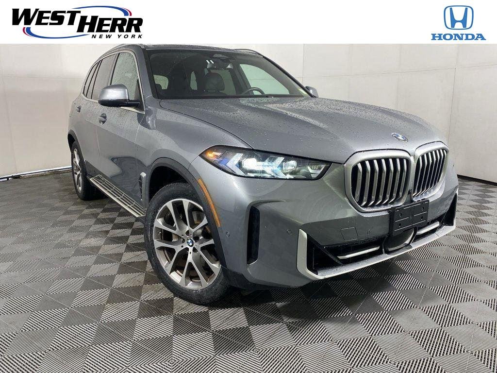 Used 2024 Gray Metallic BMW xDrive40i image 1