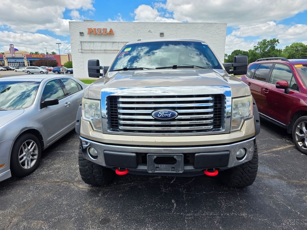 Used 2012 Pale Adobe Metallic Ford XLT image 1