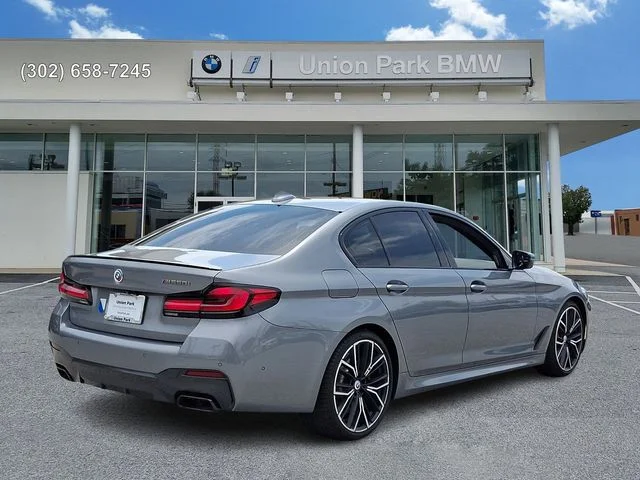 Used 2023 Skyscraper Grey Metallic BMW M550i xDrive image 4
