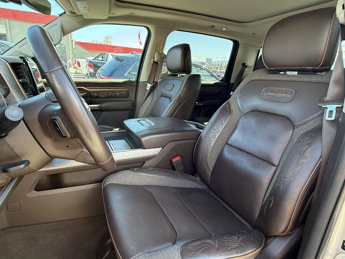 Used 2025 Silver RAM Limited Longhorn 4x4 Crew Cab 5