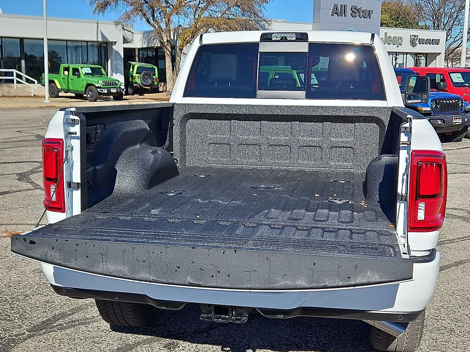 New 2026 Bright White Ram LARAMIE CREW CAB 4X4 6