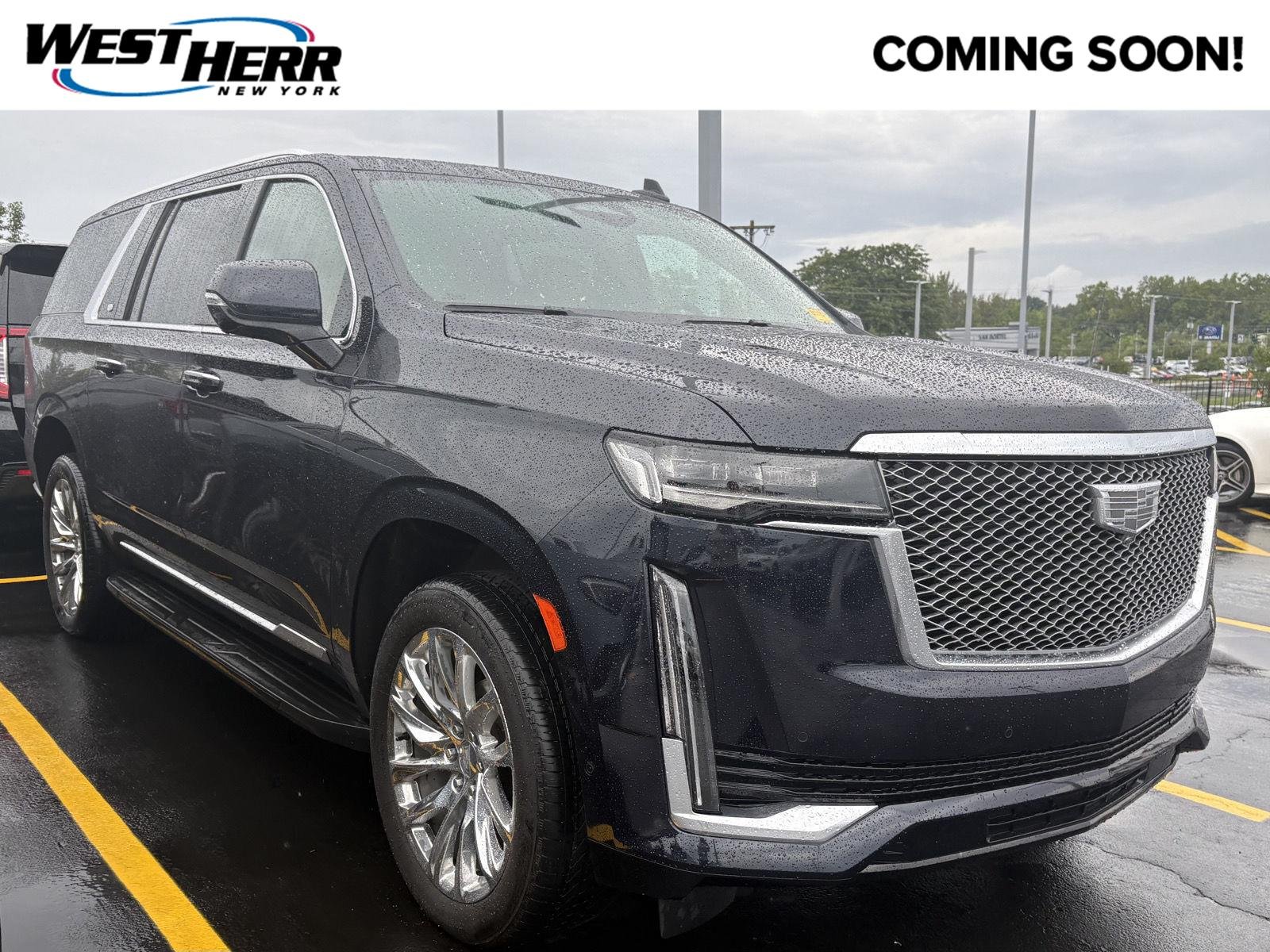 Used 2022 Dark Moon Blue Metallic Cadillac Premium Luxury image 1