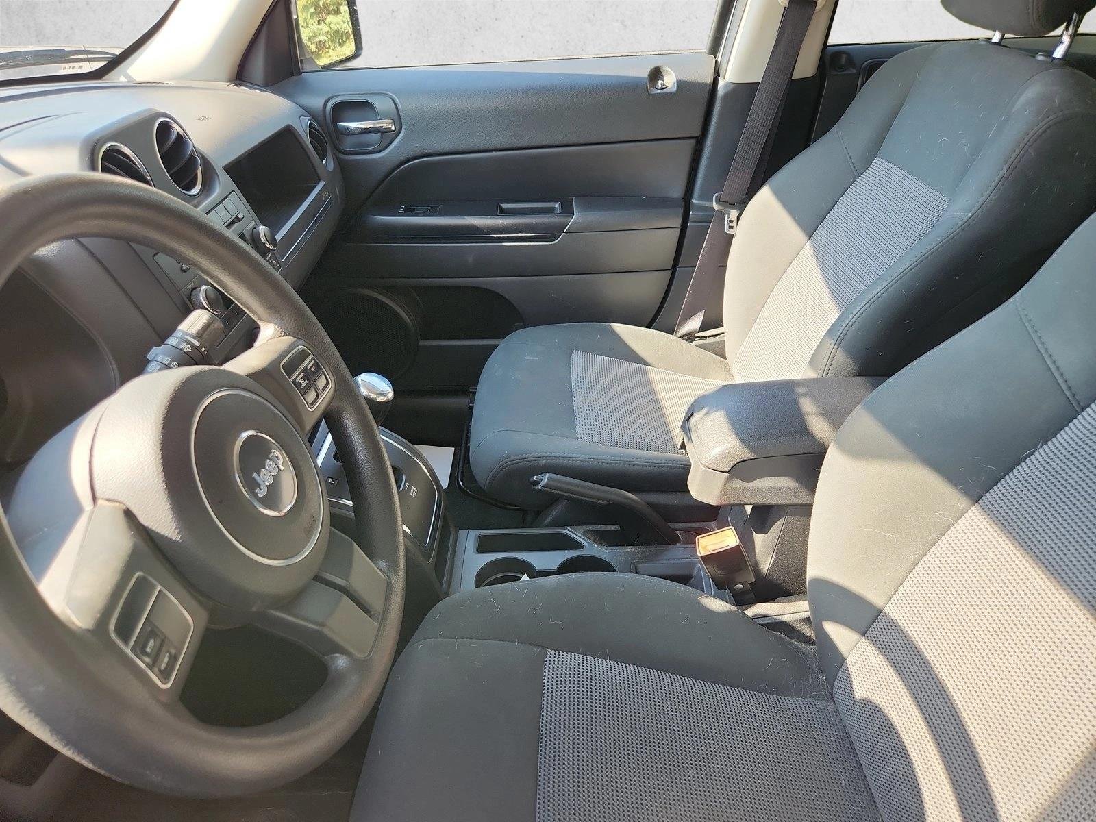 Used 2011 Bright Silver Metallic Jeep Sport image 11